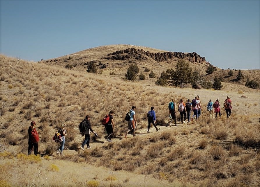 Group hiking near OMSI's Hancock Field Station, in Fossil, Oregon.