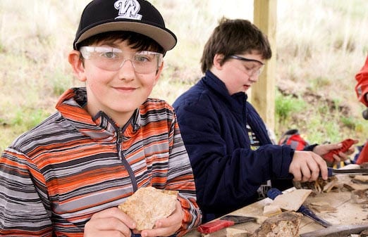 Students working in the Paleontology Lab at OMSI's Hancock Field Station Camp site.